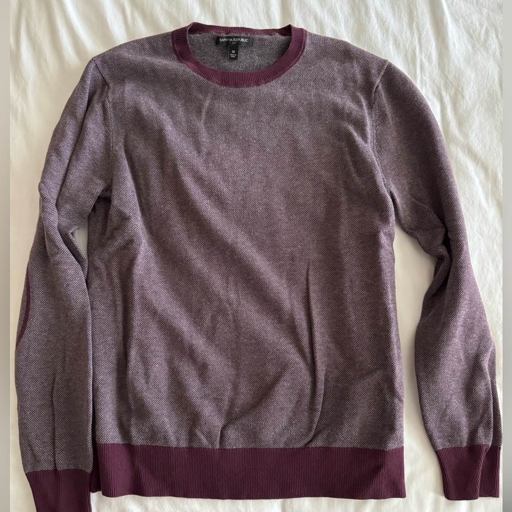 Men's maroon sweater.